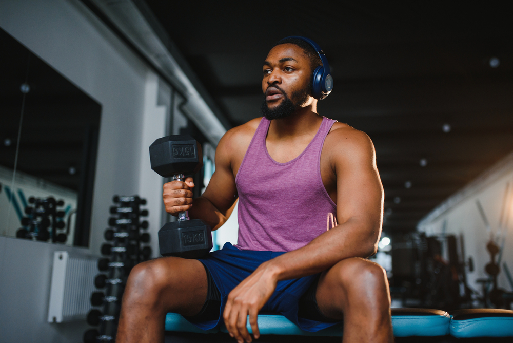 man lifting weights.